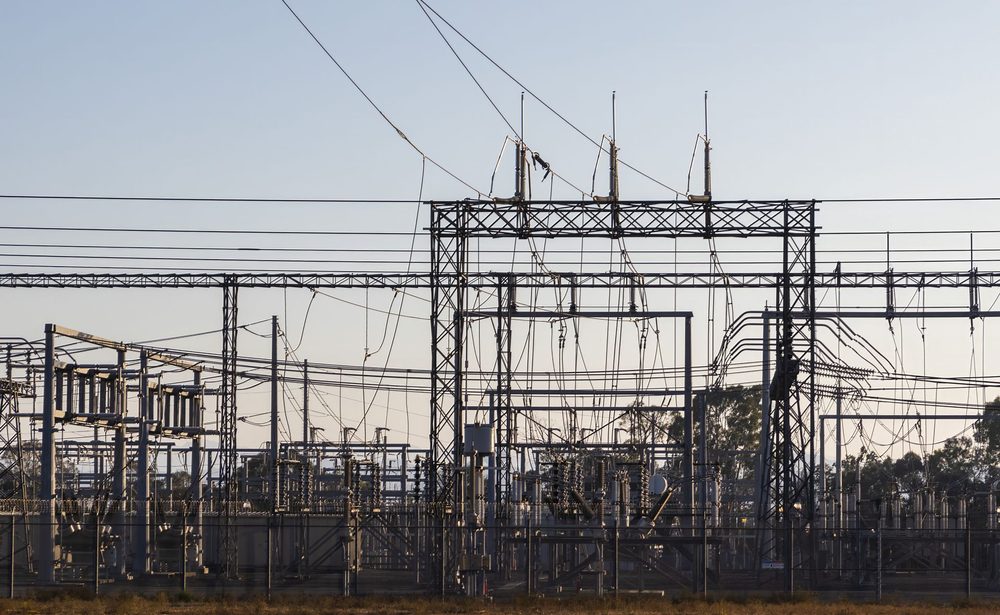 High-voltage substation at dawn